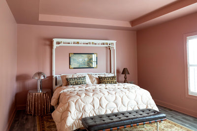 A Dusty Pink Glow Steals the Show in This Cozy, Curated Bedroom