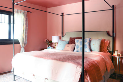Saturated Pink Shades Offset This Storybook Bedroom’s Lack of Natural Light
