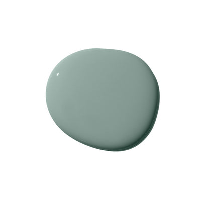 Wet paint featuring the color Mellow Mood from Clare, a green gray paint color that complements neutrals and easily adapts to other hues.